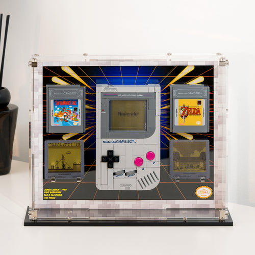 LEGO Game Boy set 72046 and its game cartridges in a clear acrylic display case on a black stand, front view